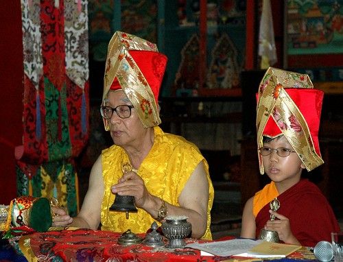 Wearing the Sashu, Tibetan Lamas His Holiness Jigdal Dagchen Sakya and his grandson HE Asanga Sakya Rinpoche conclusion of prayers, ringing vajra handled bells, Tharlam Monastery, Boudha, Kathmandu, Nepal by Wonderlane