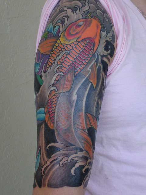 Tattoo Half Sleeve side view Koi FIsh and water Close up