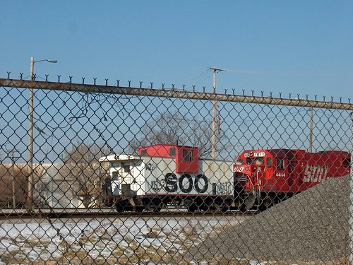 Former Soo Line equipment behind a fence. Schiller Park Illinois. January 2007. by Eddie from Chicago