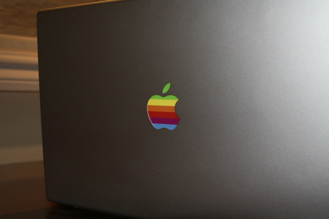 My MacBook Pro with a retro Apple logo I added the stripes with an insert