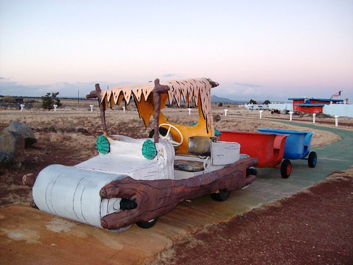 All Aboard!  Flintstones' car and carts at the tourist trap of Bedrock City, AZ (bedrock48xy)