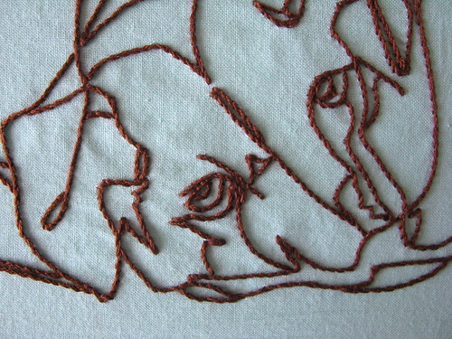 Detail of stitching and the dog eye...