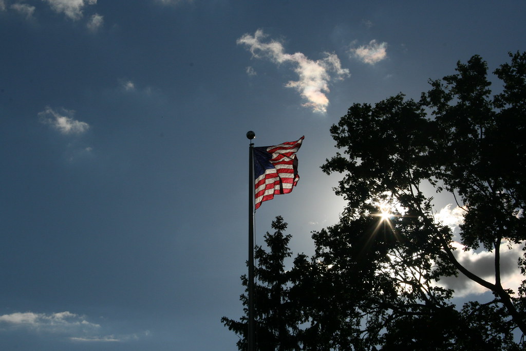 American flag over library square by Davef3183, on flickr
