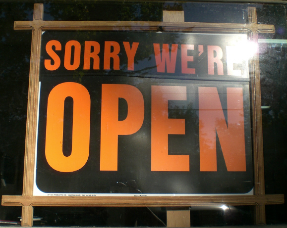 'sorry we're open' sign