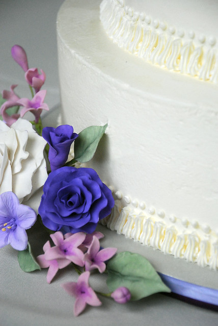 Purple 4 tier italian buttercream wedding Cake