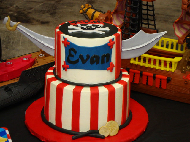 Pirate cake All edible sword made from gumpaste and all other accents are
