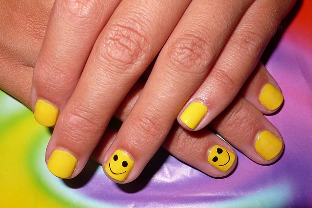 One quirky nail art design that will show case a happy personality is a