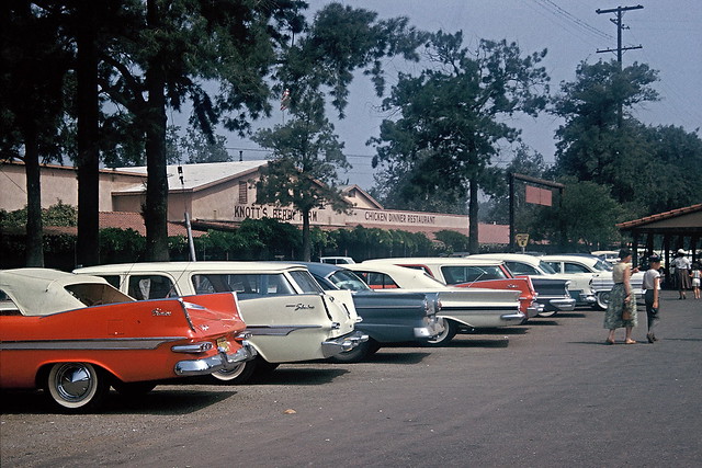 Cars with fins, parking lot at Knott's Berry Farm, 1960