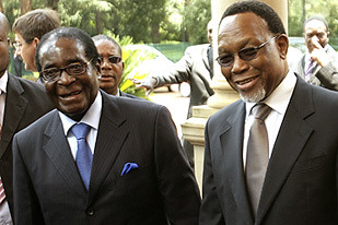 Zimbabwe President Robert Mugabe along with South African Deputy President Kgalema Motlanthe at a regional summit to discuss the situation in the Southern Africa region. by Pan-African News Wire File Photos