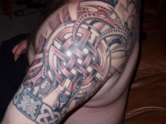 male shoulder tribal tattoo