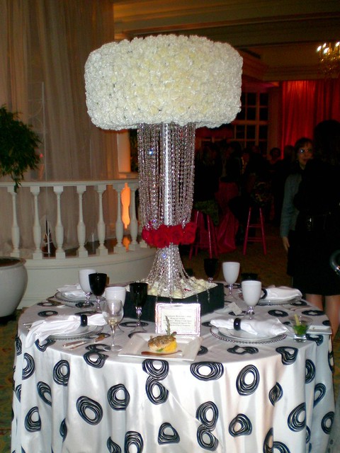 White bling wedding centerpiece White carnations are compacted at the top