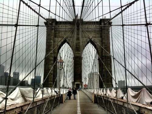 Despite the doom & gloom, Morgen, Robin, and I walked across the Brooklyn Bridge today. The Bike Laners were insane.