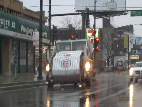 Eastbound Chicago Department of Streets and Sanitation street sweeper vechicle in Chicago Cubs markkings. Chicago Illinois. Early April 2007. by Eddie from Chicago