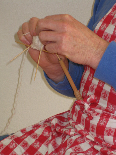 Knitting sheath with sock needles