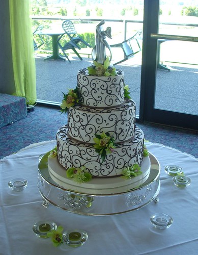 Ivory wedding cake with chocolate scrolls Ivory IMBC with chocolate ganache