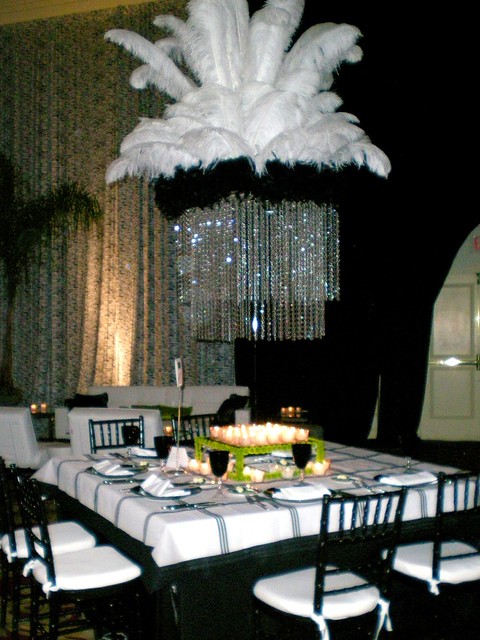 Huge ostrich feathers make this wedding centerpiece over the top