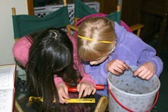 Sophia and Hannah Measuring a Worm