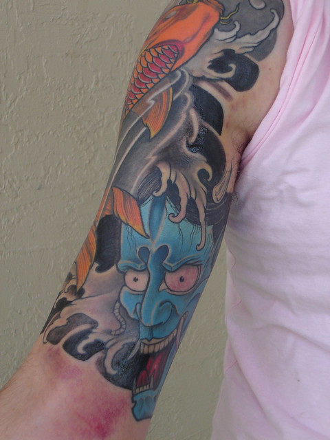 Tattoo Half Sleeve underneath Hanya Mask