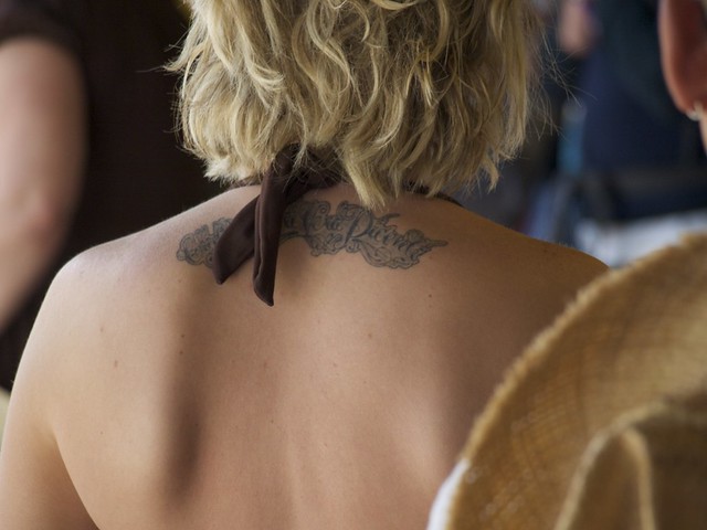 Female Upper Back Tattoo