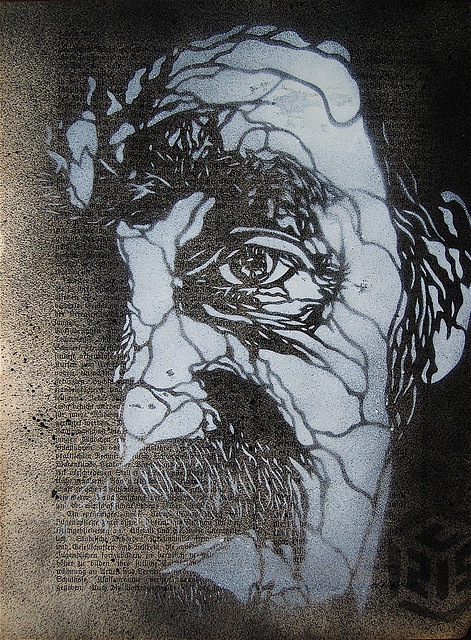 C215 - 'Homeless' on antique bookpage.