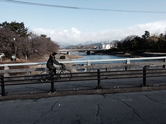 Cycling near Demachiyamagi snow on hills up north
