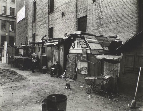 Huts and unemployed, West Houston and Mercer St., Manhattan.