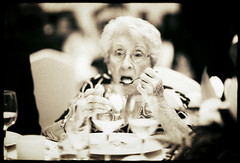 Edward Olive   fotos de boda madrid - creative wedding photography - bride's grandmother eats sorbet ice cream out of cocktail type glass