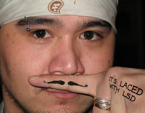 Mustache Tattoo Why else would he have a mustache on his finger