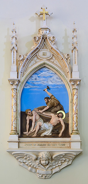 Saint George Roman Catholic Church, in New Baden, Illinois, USA - XIth station of the cross, Jesus is nailed to the cross