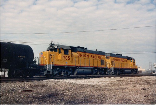Union Pacific EMD model GP-15 light roadswitchers and tank cars at Hayford Junction. Chicago Illinois. May 1987. by Eddie from Chicago