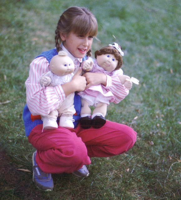 1980s (mid) - Eve - holding Cabbage Patch Kids dolls - kneeling - 0025