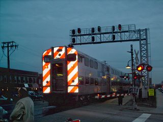 Westbound Metra commuter local departing the Berwyn commuter rail station on South Oak Park Avenue. Berwyn Illinois. March 2007. by Eddie from Chicago