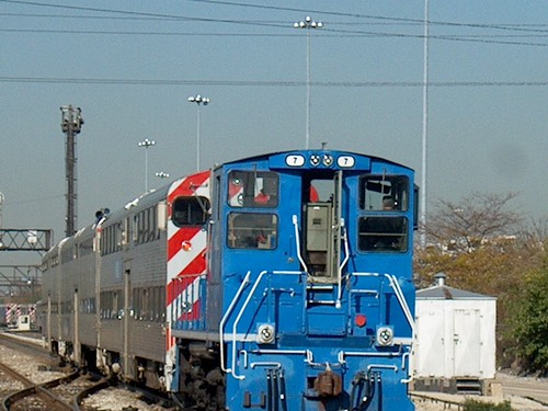 Metra coach yard switcher towing a cut of cars. Chicago Illinois. October 2006. by Eddie from Chicago
