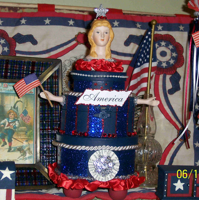 An AllAmerican wedding cake of sorts Three navy blue boxes are connected 