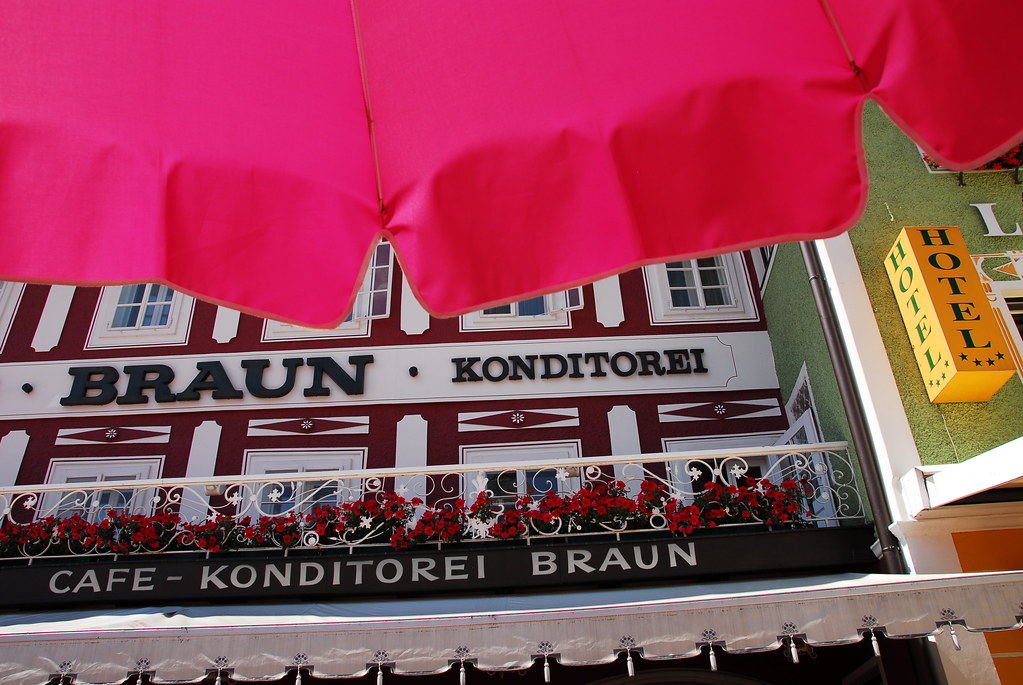 under a pink umbrella