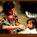 Guatemala-market-woman-child-cola