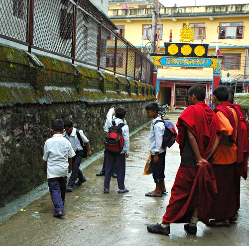 Boys playing Street Games while the monks look on, Tharlam Monastery road, Boudha, Kathmandu, Nepal by Wonderlane