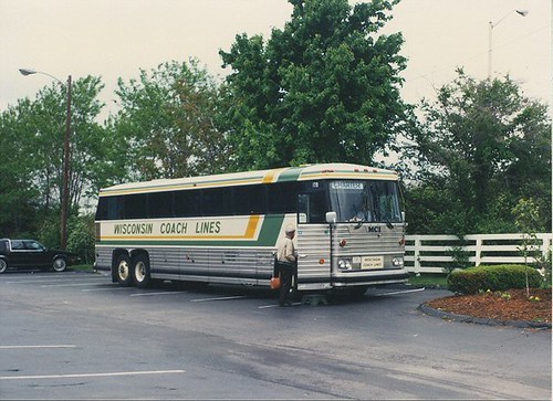 Wisconsin Coach Lines bus in the parking lot of the Kentucky Horse Farm. Lexington Kentucky. May 1990. by Eddie from Chicago