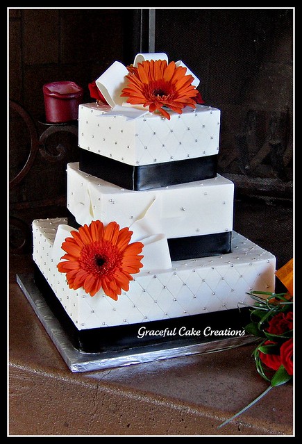 Square wedding cake with a quilting pattern silver dragees white fondant 