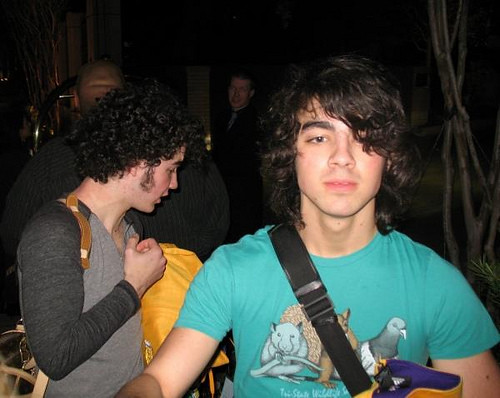 Joe Jonas with curly hair