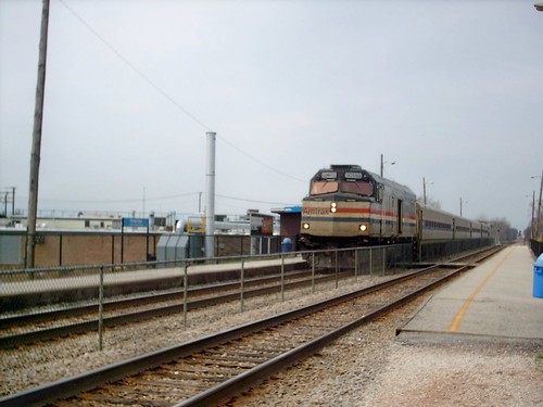 Southbound Amtrak train from Milwaukee Wisconsin passing through the Metra forest Glen commuter rail station on Chicago's far northwest side. Chicago Illinois. March 2007. by Eddie from Chicago