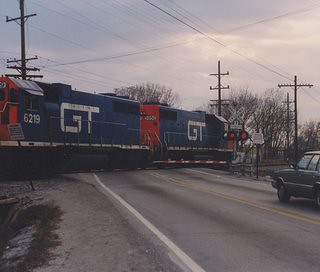 Northbound Grand Trunk western freight train crossing 123rd Street. Alsip Illinois USA. April 1990. by Eddie from Chicago
