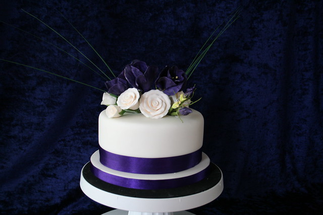 White and Purple Lisianthus rose wedding cake Purple sugar paste 