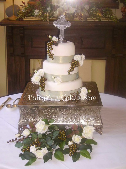 This Celtic wedding cake is topped with a pewter cross