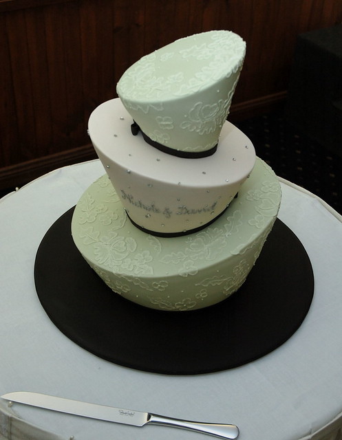 Three tiered wedding madhatter A sage green ivory and black madhatter