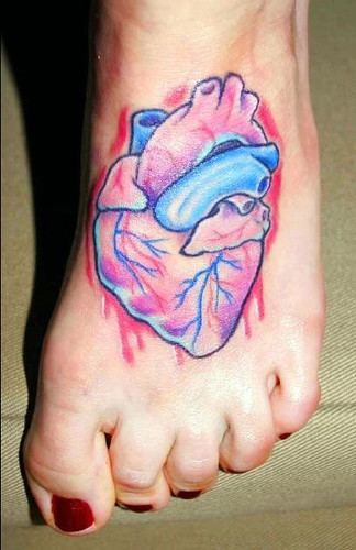 Anatomical heart tattoo on foot