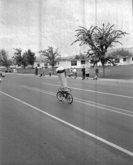 Fire Prevention Parade, 1955, Kid in Dangerous Cosume on Bike