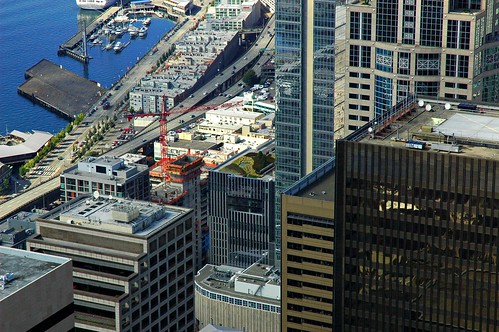 Green garden, top of Seattle skyscraper, crane, Puget Sound, Washington, USA by Wonderlane