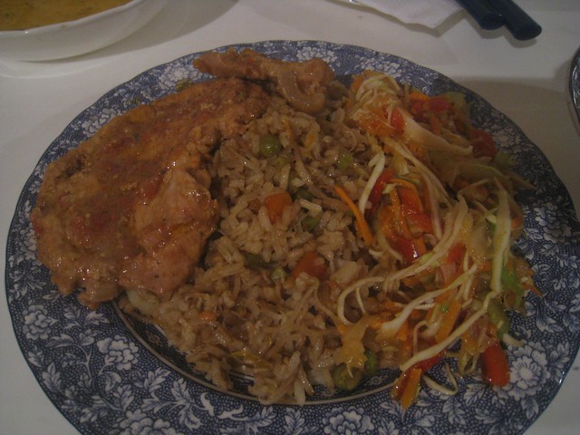 Pork cutlets with mixed rice and salad