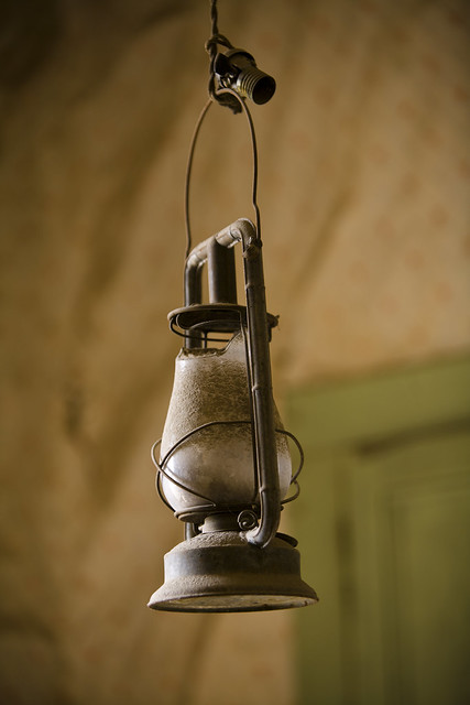 Kerosene lamp hanging in the Miller House in Bodie